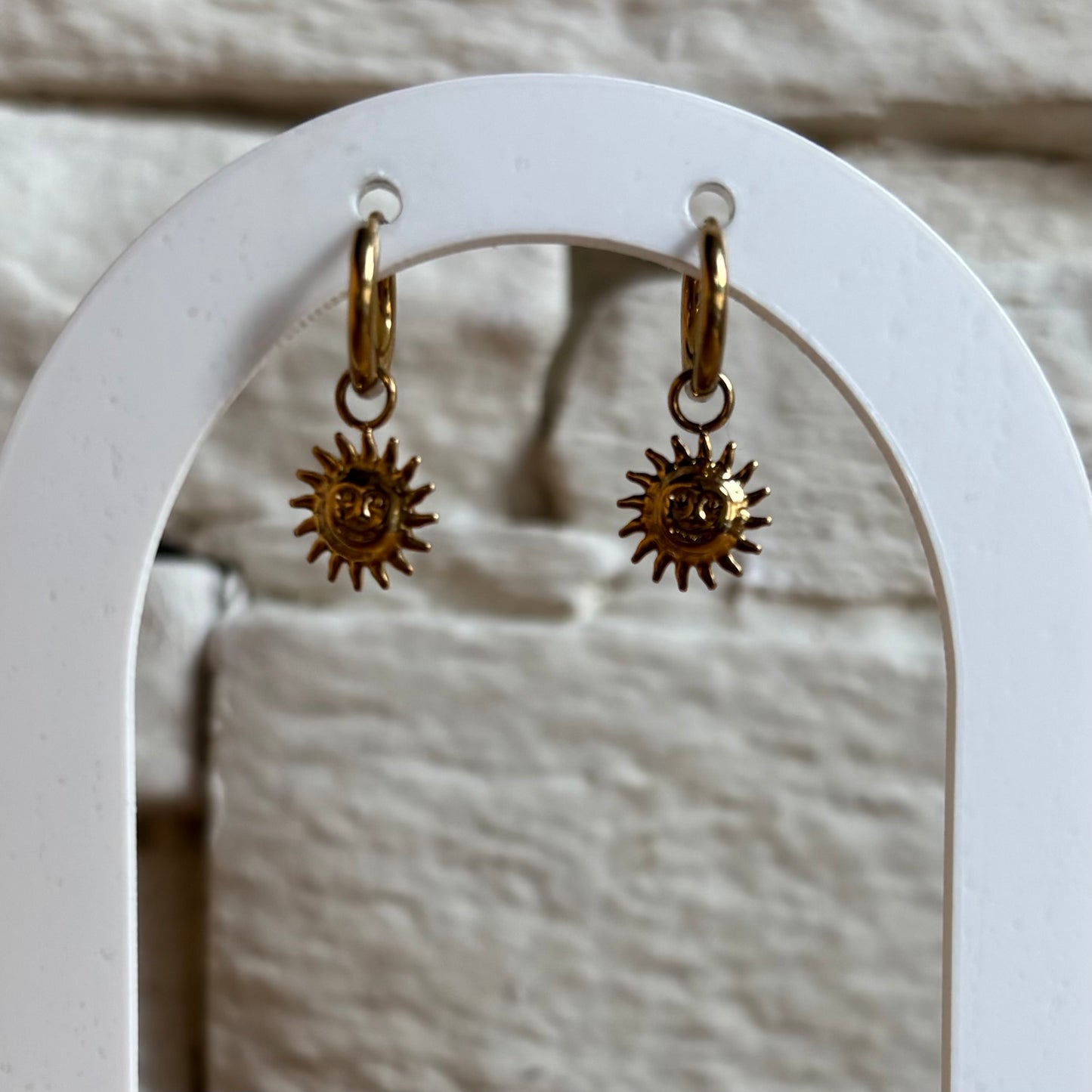 Boucle d'oreille soleil