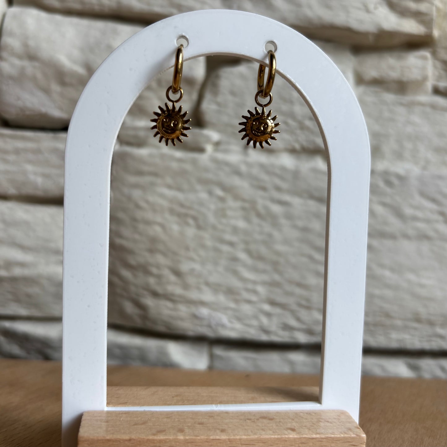 Boucle d'oreille soleil